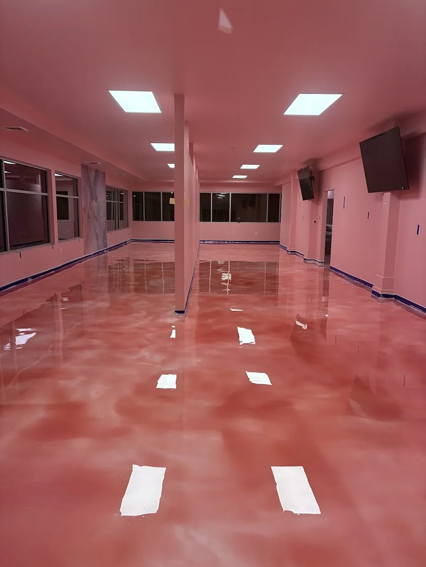 A finished glossy pink epoxy floor